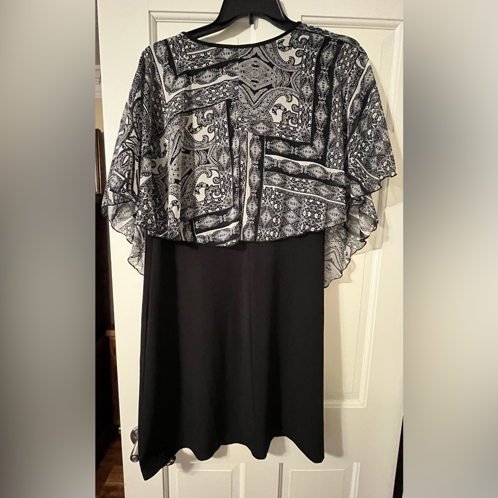 Dress with attached overlay